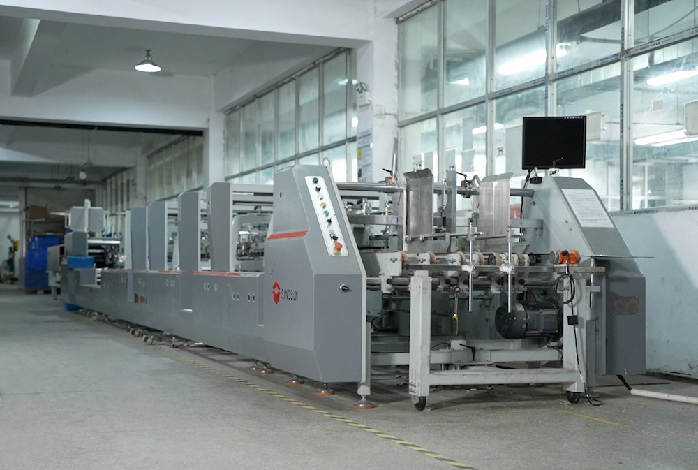 東莞產 粵龍牌 YL-1100PC-C型 高速自動糊盒機及噴槍系統